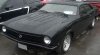 Maverick black wicked four door with chopped roof.jpg